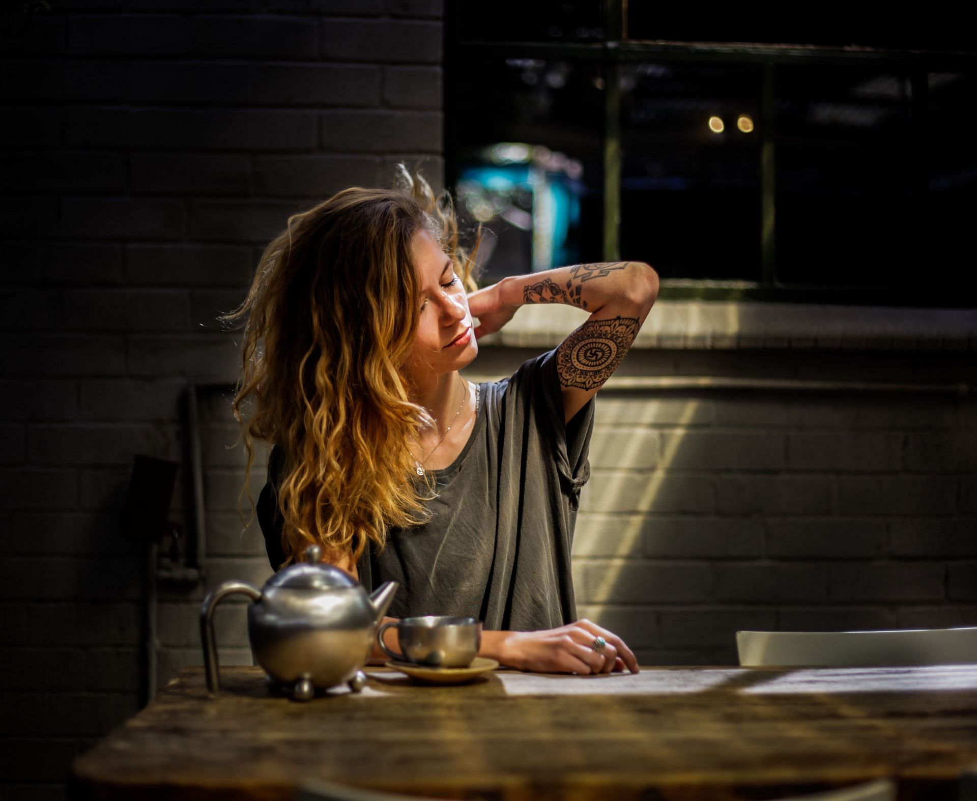Neck stretches are best stretches for bedtime. (Image via Unsplash/ Keenan Constance)
